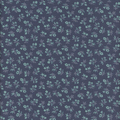 Riley Blake Fabrics Farmer's Daughter by Lori Holt Vintage Denim Blue, fabric with a floral pattern of small light blue and white flowers and leaves on a dark denim blue background.
