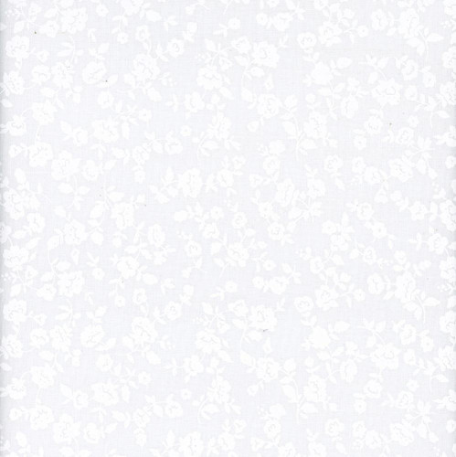 Wilmington Prints Fabrics Garden Whispers Small Floral White on White, close-up view of a white fabric with a subtle small floral pattern in white.
