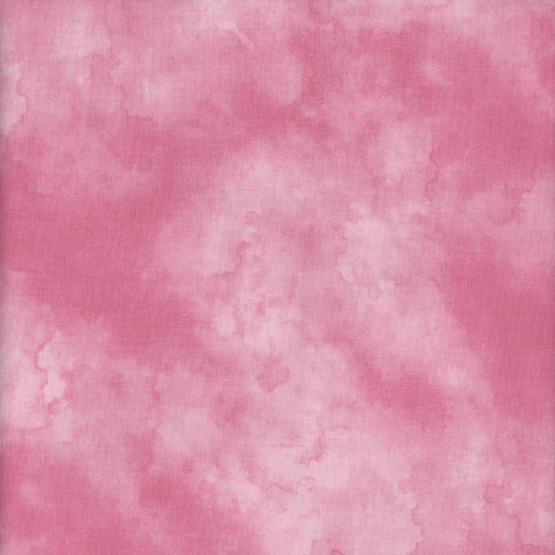 Wilmington Prints Fabrics Mist Nancy Mink Texture Pink, a close-up of pink fabric with a watercolor-like texture and subtle color variations.