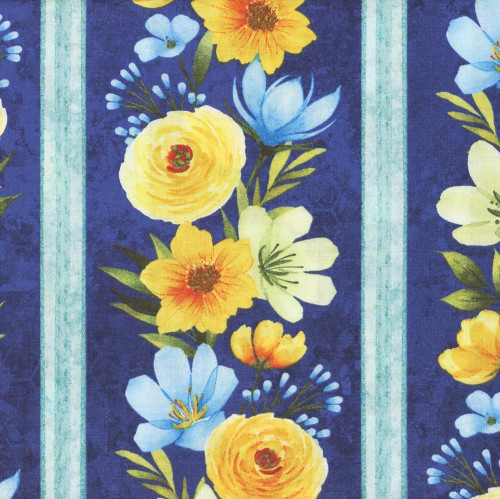 Wilmington Prints Fabrics Gentle Meadow Lola Molina Repeating Stripe Multi, vibrant floral patterned fabric with yellow, blue, and white flowers on a navy background.