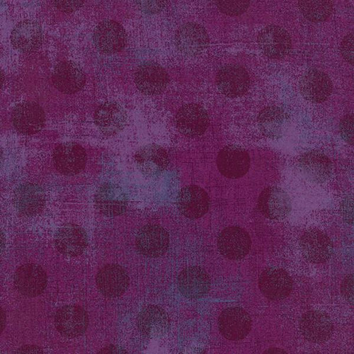 Moda BasicGrey Grunge Hits the Spot Plum Purple fabric, fabric with a textured pattern of large polka dots in a deep plum purple color with a distressed, grunge style appearance.