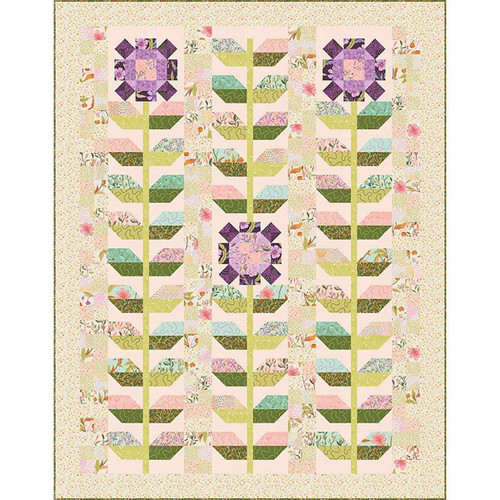 Moda Fabrics Floral Fondant Linn Warme Maisy Daisies Quilt Kit, colorful quilt with floral and daisy patterns, featuring pink, purple, green, and pastel colors.