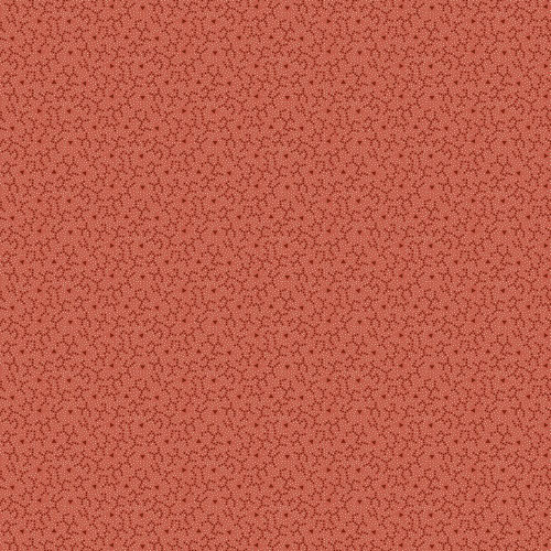 Marcus Fabrics Kathleen's Story Christine Schulte Lace Coral, a detailed coral lace fabric with tiny dotted and triangular patterns.