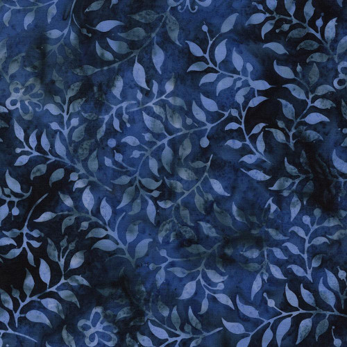 Lumin Fabrics Island Batik Radiant Wings Butterfly & Leaves Blue Denim, fabric with a blue denim background and a floral and butterfly pattern in various shades of blue.