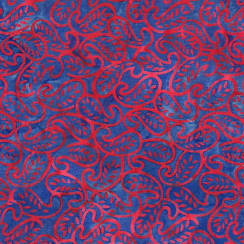 Lumin Fabrics Island Batik Paisley Parade Mini Leaf Paisley Multi Red Blue, colorful fabric with red paisley and leaf patterns on a blue background.