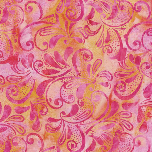 Lumin Fabrics Island Batik Paisley Pop Large Paisley Swirl Multi Pink Orange Sunset, vibrant fabric with large pink and orange paisley swirls on a warm yellow-orange background.