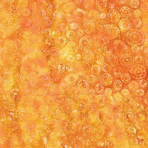 Lumin Fabrics Island Batik Starry Seas Amoebic Shapes Orange Cheddar, close-up of fabric pattern featuring amoebic shapes in shades of orange, yellow, and pink.