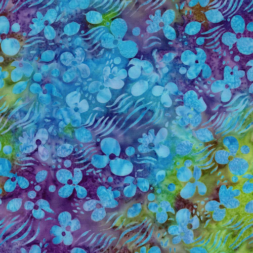 Lumin Fabrics Island Batik Garden Bloom Floral Drift Multi Green Purple Mardi Gras, vibrant multicolor floral batik fabric with blue flowers and green and purple accents.