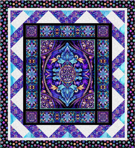 Quilting Treasures Fabrics Royale Dan Morris Flying Carpet Quilt Kit, intricate stained glass style design featuring vibrant blue, purple, and gold colors with floral and geometric patterns.