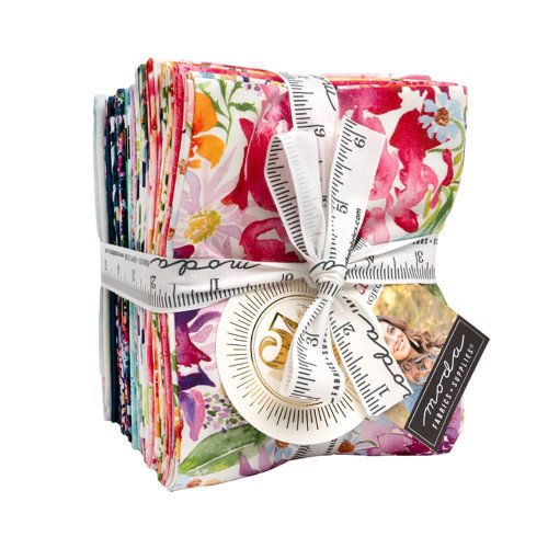 Moda Fabrics Soulstice Create Joy Project 23 Fat Quarters, colorful floral fabric bundle tied with a measuring tape and ribbon.
