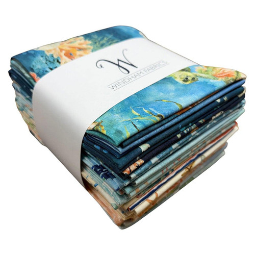 Windham Fabrics Ocean Life Leslie Trimbach for Whistler Studios Fat Quarter Bundle Multi, a neatly folded fabric bundle featuring vibrant ocean-themed patterns and colors.