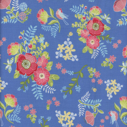 Riley Blake Fabrics Awakening Spring Flowers Lady Bugs Birds Azure Blue, floral fabric pattern with blooming flowers, ladybugs, hummingbirds, and small insects on a blue background.