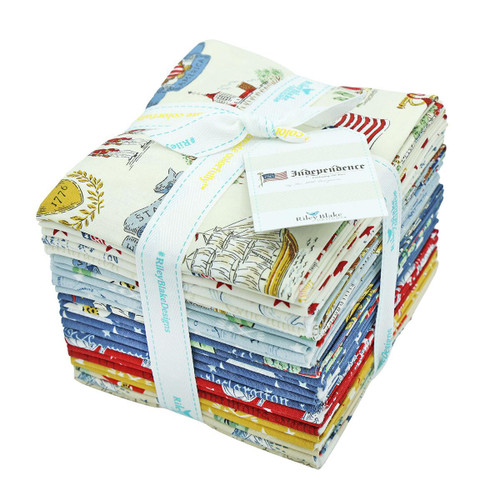 Riley Blake Fabrics Independence Fat Quarter Bundle, 24 Pcs, neatly folded fabric squares with patriotic and Americana designs, wrapped with a white ribbon for quilting and crafting projects.