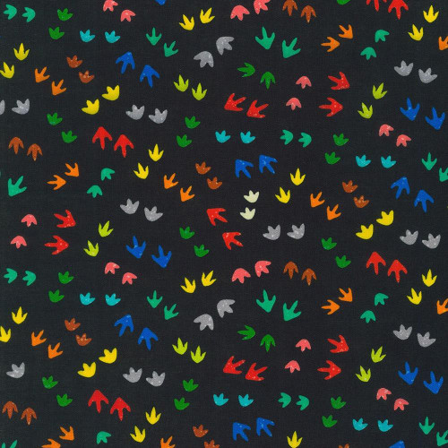 Robert Kaufman Fabrics Alphabetosaurus Dinosaur Tracks Bright Black, colorful dinosaur footprints on a black fabric background.