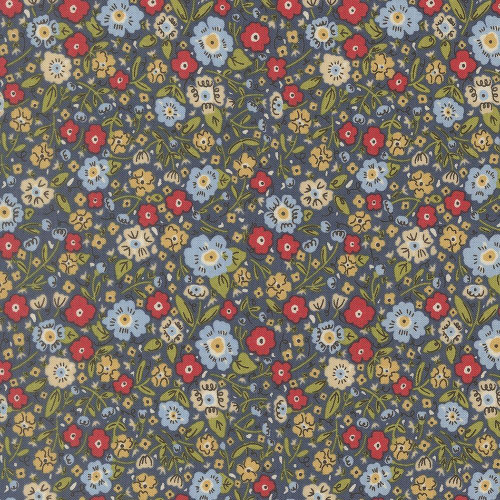 Moda Fabrics The Henhouse Gingiber Denim Blue Calico Floral fabric, with a detailed pattern of small blue, yellow, and red flowers and green leaves on a denim blue background.