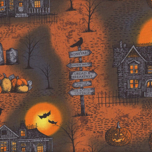 Wilmington Prints Moonlit Manor Lisa Jane Smith Spooky Haunted Houses Black Purple, Halloween-themed fabric with haunted house illustrations, pumpkins, bats, moonlight, and directional signs in a dark orange and black color scheme.