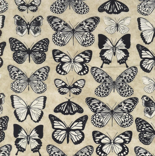 In The Beginning Fabrics Sketchbook Prints by Jason Yenter Sand Cream Butterflies, a fabric with black and white butterfly patterns on a beige background.