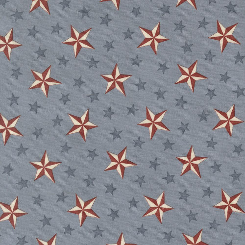 Moda Fabrics America 250 Years Deb Strain Tossed Stars Americana Light Blue, fabric with red, white, and blue stars pattern.