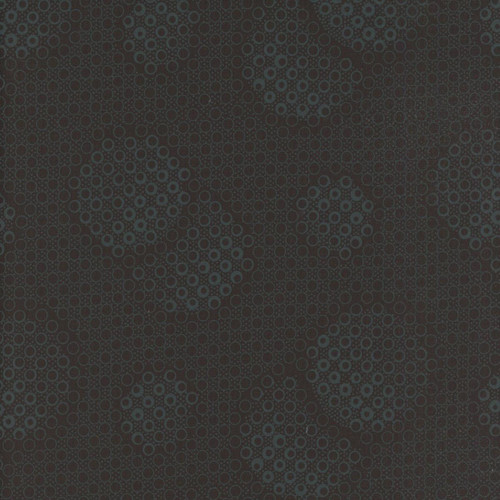 Studio E Fabrics Dark Shadow Black on Black Double Dots Dark Shadows fabric, close-up of black fabric with dark gray dotted circle pattern.