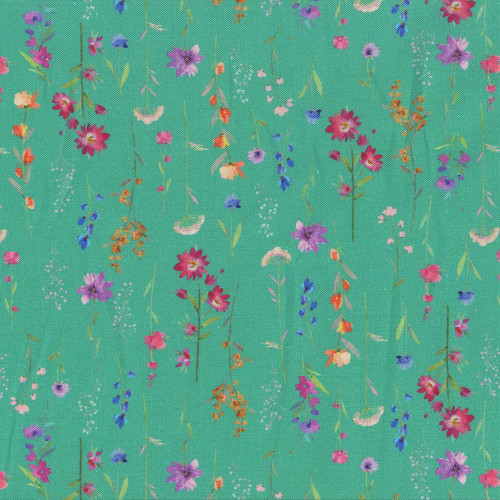 Windham Fabrics Serafina Whistler Studios Bright Garden Chrysocolla, floral printed fabric with a green background and colorful small and large flowers in purple, pink, orange, and blue.