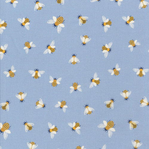 Dear Stella Fabrics To Bee Or Not To Bee Buzzing Celeste, fabric with a bee pattern on a light blue background.