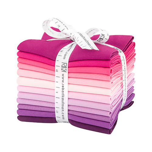 Robert Kaufman Fabrics Kona Cotton Pre Cuts 12 Fat Quarters Wildberry, bundle of pink and purple fabric fat quarters tied with a white measuring tape ribbon.
