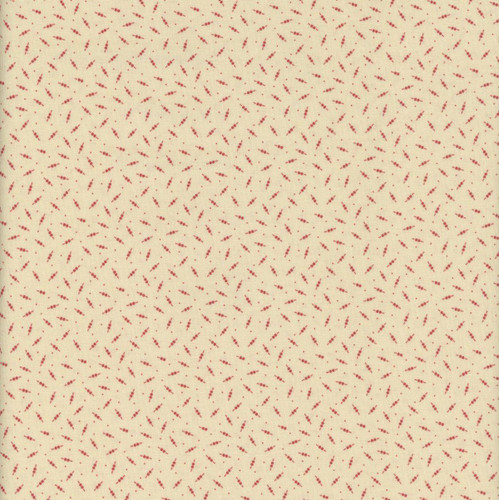 Marcus Fabrics Making Waves Katie Solberg Double Dots Cream, fabric with small red dotted patterns on a cream background.