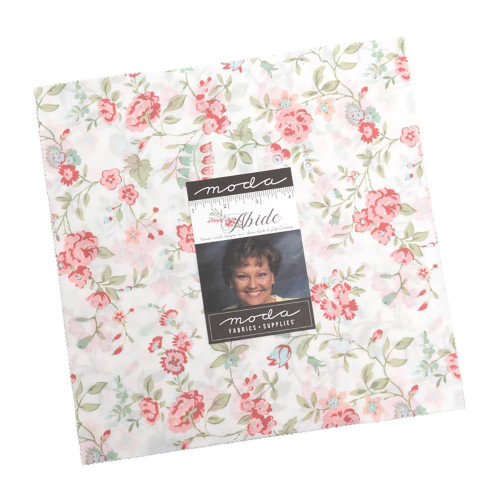 Moda Fabrics Abide Brenda Riddle Ten Inch Squares Layer Cake, floral fabric with pink, green, and blue colors in a layered quilt layer cake pack.
