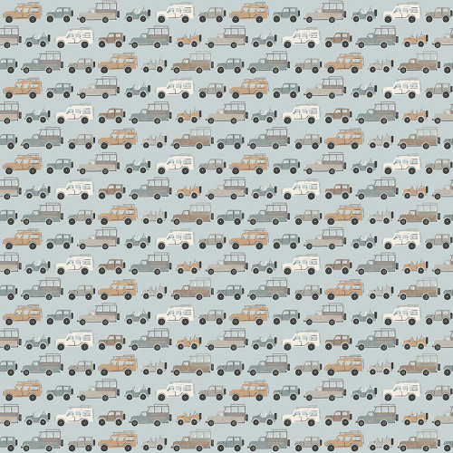 Riley Blake Fabrics Leo and Savannah Deena Rutter Rovers Blue, fabric featuring a pattern of various vehicles in shades of beige, gray, navy, and white on a light blue background.