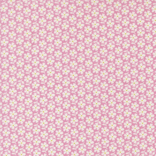 Moda Fabrics Summers End Fig Tree Co Lilac Pink Small Daisies Floral, close-up of fabric with small white daisies with yellow centers on a pink background.