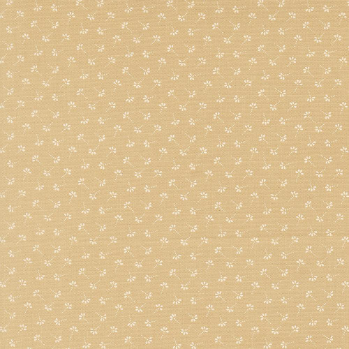 Moda Fabrics Summers End Fig Tree Co Almond Pie Tan Dandelion Wisps, fabric with small white floral pattern on tan background.