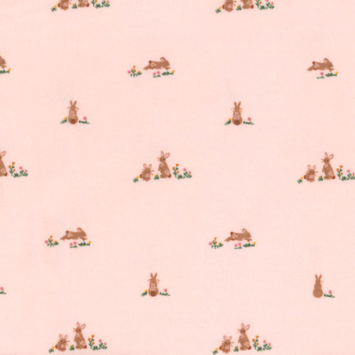 Riley Blake Fabrics Designer Flannel Sweet Cotton Tales Flopsy Fields Blush, pink fabric featuring cute illustrated rabbits and floral designs.