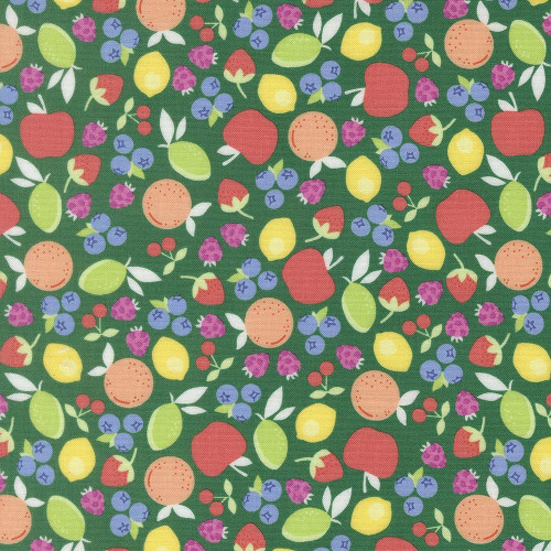 Moda Fabrics Fruit Salad Corey Yoder Fruit Cup Emerald Green, colorful fabric with a fruit pattern of apples, lemons, blueberries, strawberries, and leaves on a green background.