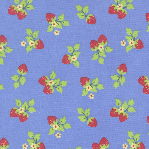 Moda Fabrics Fruit Salad Corey Yoder Strawberries Sky Blue, fabric with a pattern of red strawberries with green leaves and small white flowers on a sky blue background.