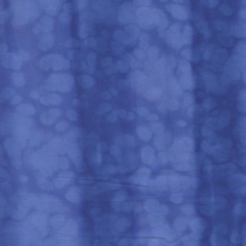 Moda Fabrics Mermaid Batiks Moda Ocean Blue, fabric pattern with a blue background and a watercolor-like pattern of lighter blue bubbles or circles.