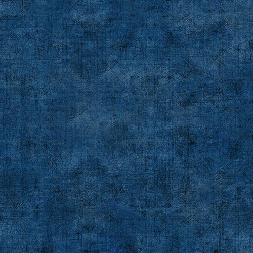 In the Beginning Fabrics Halcyon Texture Denim Blue, close-up of textured denim fabric with a distressed blue tone and subtle surface pattern.