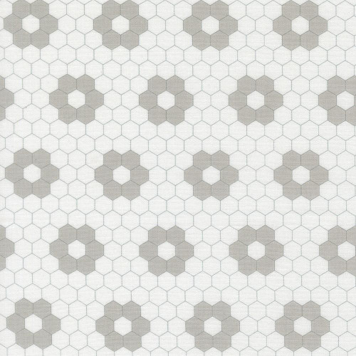 Moda Fabrics A Cat Named Stitch Camille Roskelley Quilted Hexagons Cream Grey Grey, fabric featuring a pattern of quilted hexagons in cream, grey, and light grey shades.