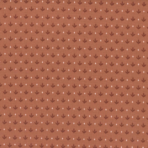 Henry Glass Fabrics Harvest Thyme Kim Diehl Falling Leaves Terracotta, fabric with a terracotta background featuring a pattern of small dark brown falling leaves and white diamond accents.