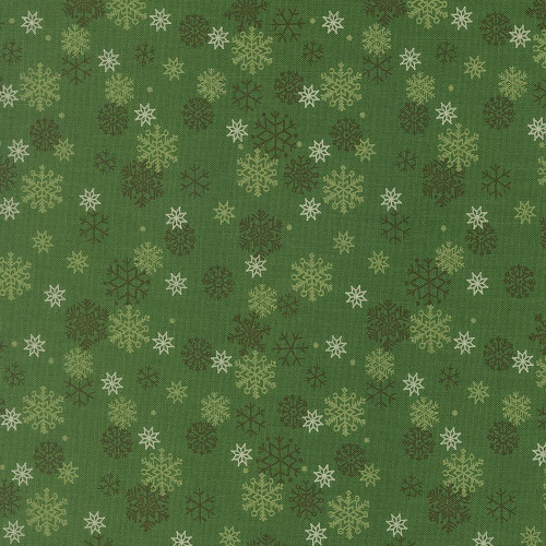 Moda Fabrics Holiday Cheer Stacy Iest Hsu Snowflake Snow Flurry Evergreen Green, festive snowflake pattern on green fabric for holiday quilting and sewing projects.
