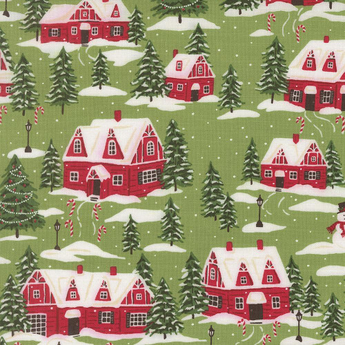 Moda Fabrics Holiday Cheer Stacy Iest Hsu Cardinals Village Scenic Mistletoe Green, festive Christmas scene fabric featuring red houses, snow-covered landscape, pine trees, candy canes, Christmas trees, and snowmen.