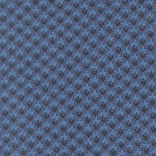 Moda Fabrics Scenery Elizabeth Hartman Meadow Floral Meadow Denim Blue, fabric with a pattern of small blue flowers on a denim blue background.