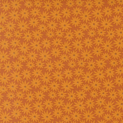 Moda Fabrics Scenery Elizabeth Hartman Sedum Floral Sedum Rusty Brown, close-up of fabric featuring a repeating pattern of orange and brown flowers with small gray centers on a warm rust background.
