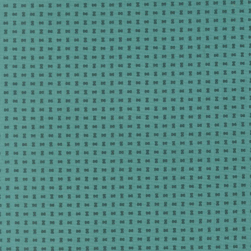 Moda Fabrics Scenery Elizabeth Hartman Spools Spools Turquoise Blue, close-up image of fabric with small turquoise blue spools pattern on a darker blue background.