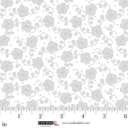 Studio E Fabrics Best of Cream and Sugar White on White Dotted Flower fabric pattern with floral design on a white background, featuring small dotted flowers.