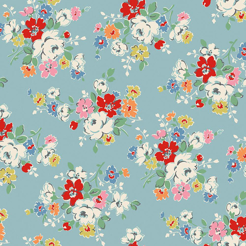 Riley Blake Fabrics Cath Kidston Signature Collection Clifton Rose Blue, floral fabric with colorful roses and leaves on a light blue background.