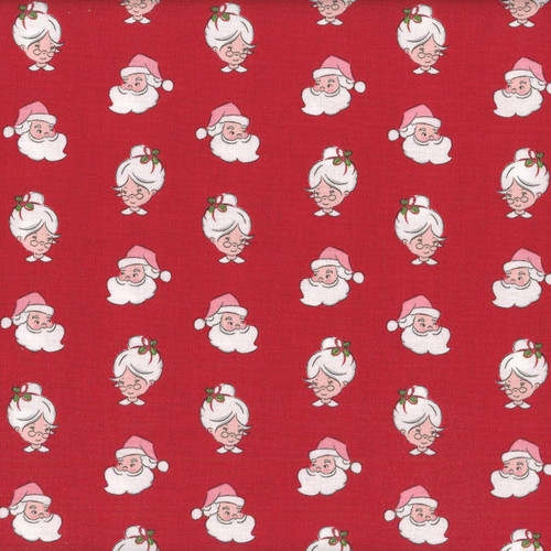 Riley Blake Fabrics Claus and Co Melissa Mortenson Santa Heads Red, festive Christmas fabric pattern with cheerful cartoon Santa heads and Mrs. Claus with white hair, pink hats, and rosy cheeks on a red background.