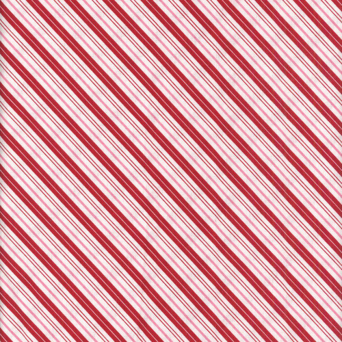Riley Blake Fabrics Claus and Co Melissa Mortenson Candy Cane Stripes Red, fabric with diagonal red and white candy cane stripe pattern.