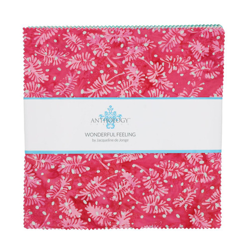 Windham Fabrics Anthology Batiks Jacqueline de Jonge Wonderful Feeling Christmas Batik Layer Cake Ten Inch Squares, pink batik fabric with white and darker pink leaf and dot patterns.