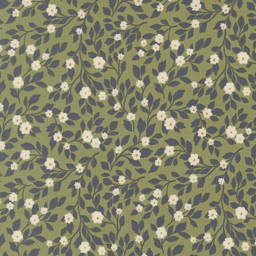 Moda Fabrics True Love Lella Boutique Daydream Posies Floral Fern Green, close-up of green fabric with white flowers and navy blue leaves pattern.