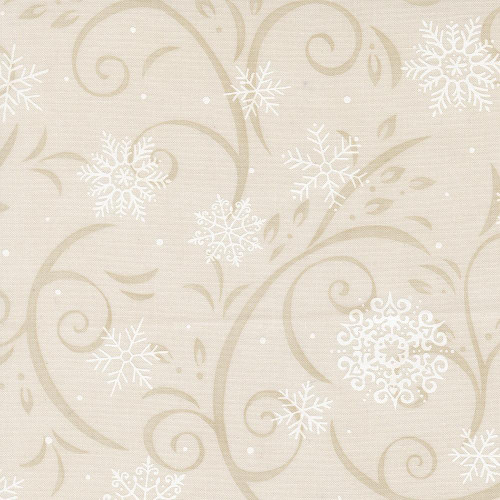 Moda Fabrics When Snow Falls Deb Strain Swirling Snowflakes Snowy White Cream, winter-themed fabric with white snowflakes and swirling patterns on a cream background.